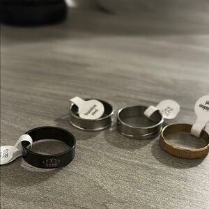 Men's Black, Silver, and Gold Rings Set